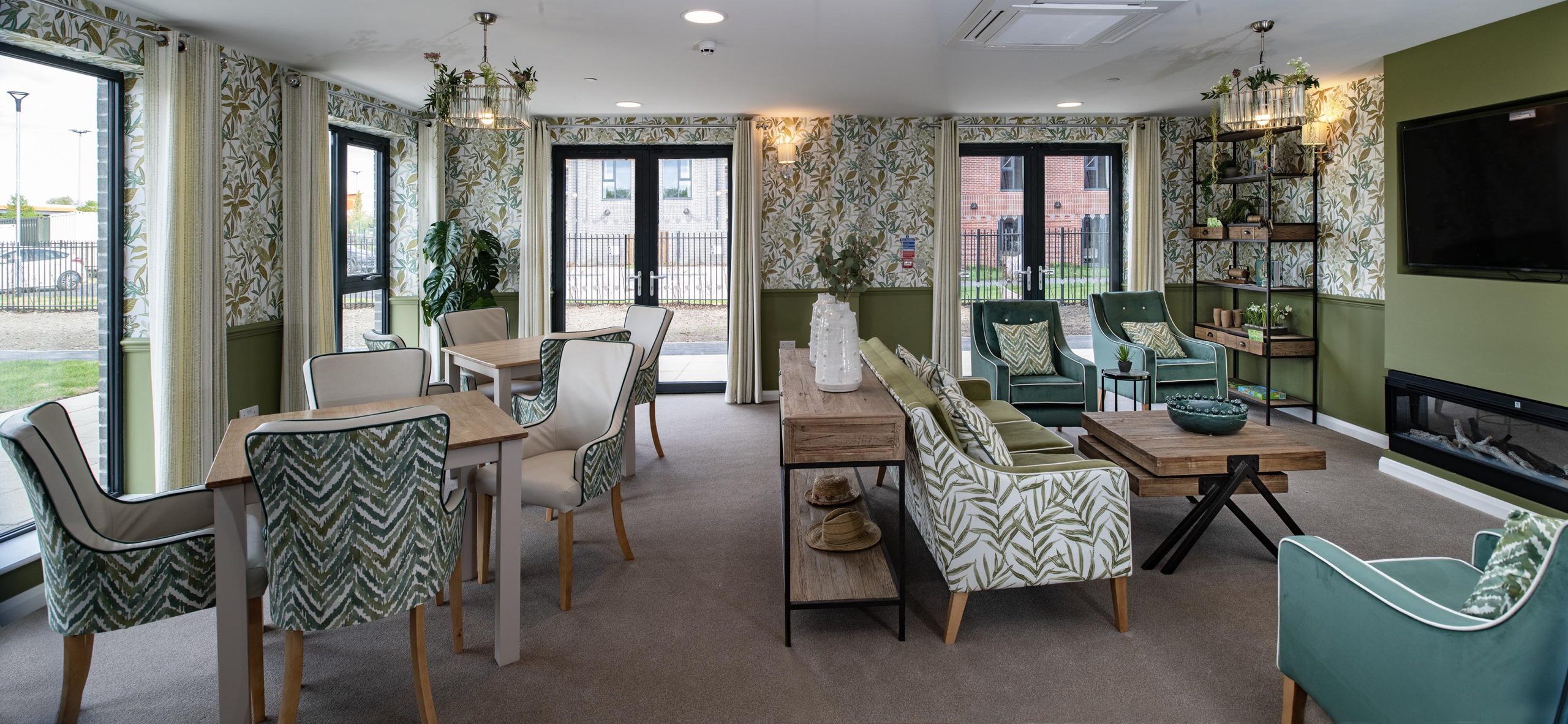 Garden room and social dining space at Trafford Waters